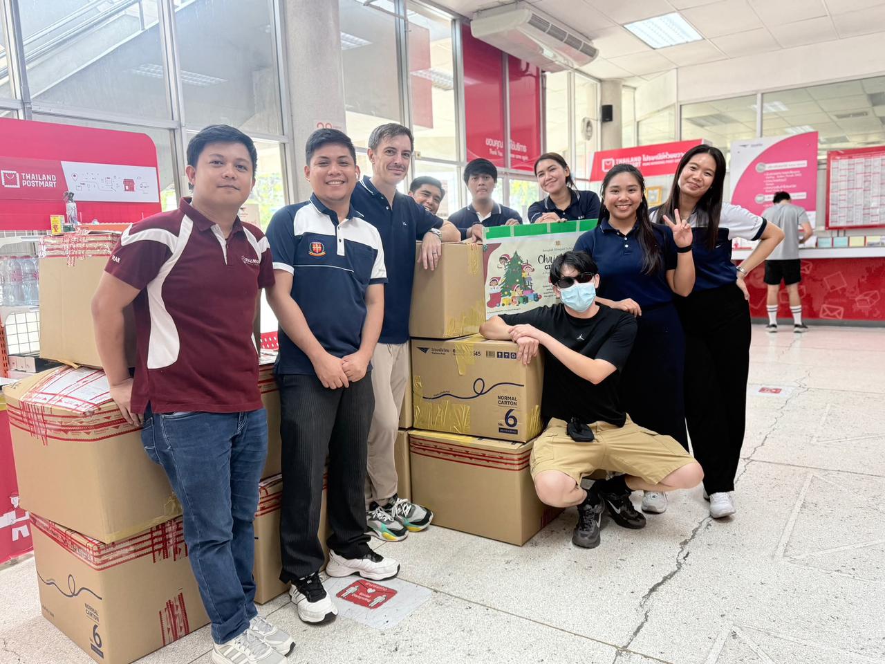 The team preparing donation parcels at Thailand Post